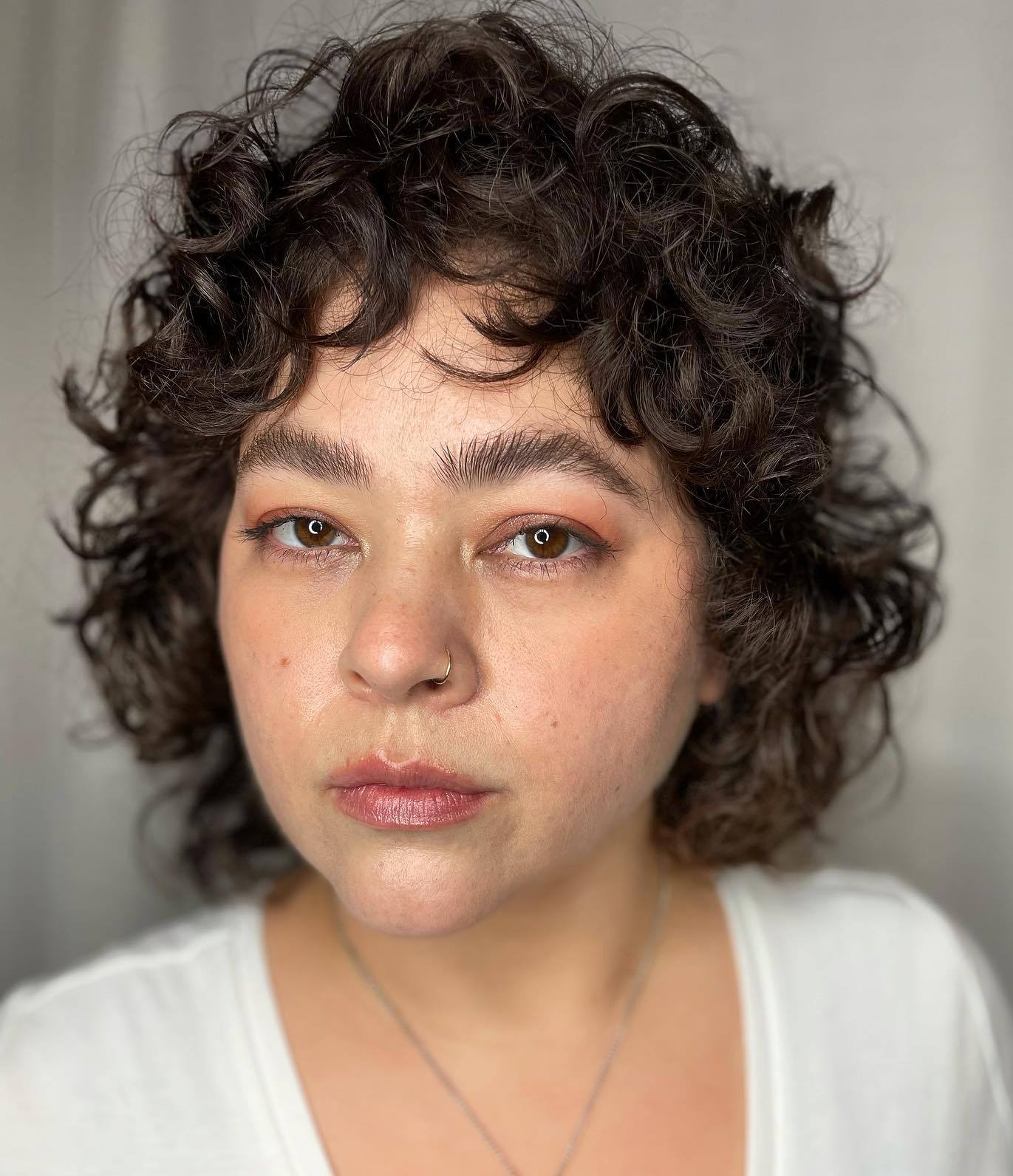 Neck-Length Curly Cut for Round Faces