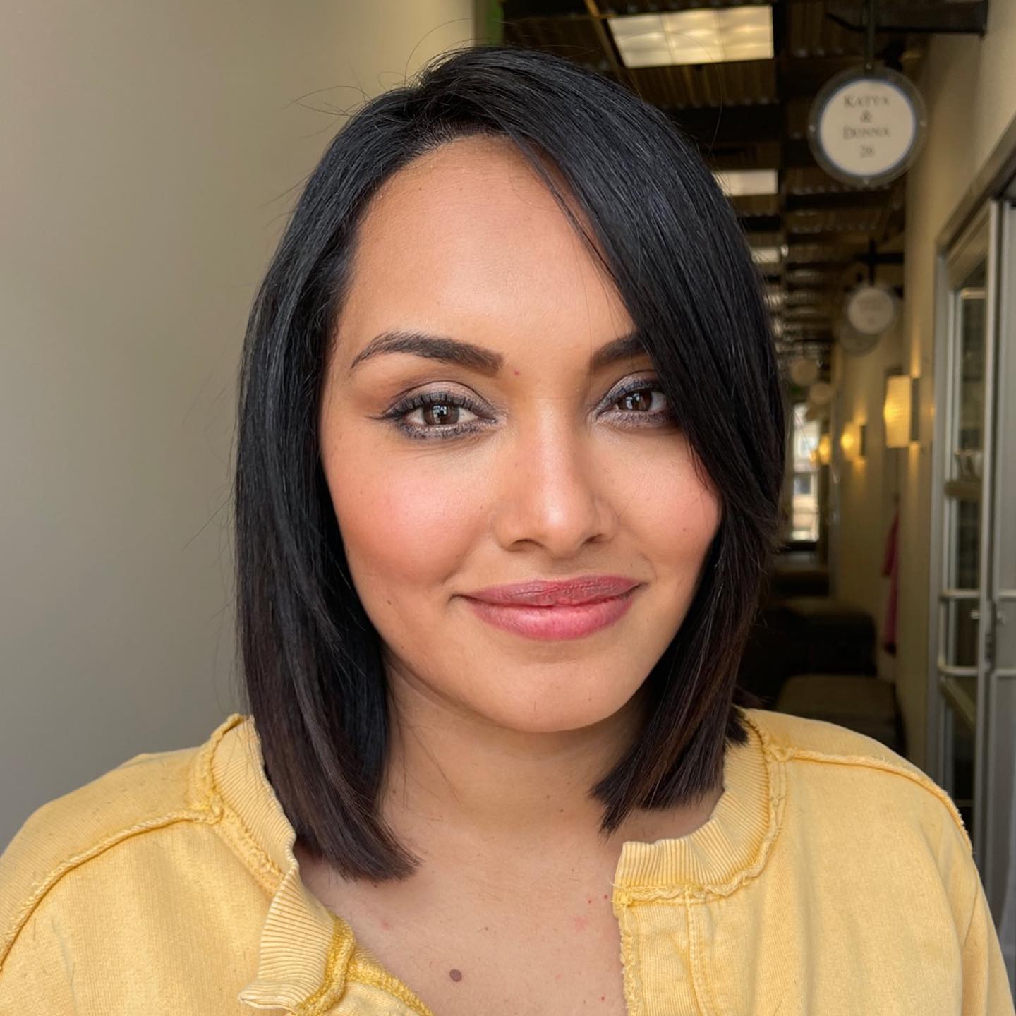 Sleek Blunt Bob with Bangs to the Side